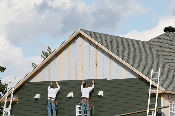 Professional Siding technician working in Covington, IN